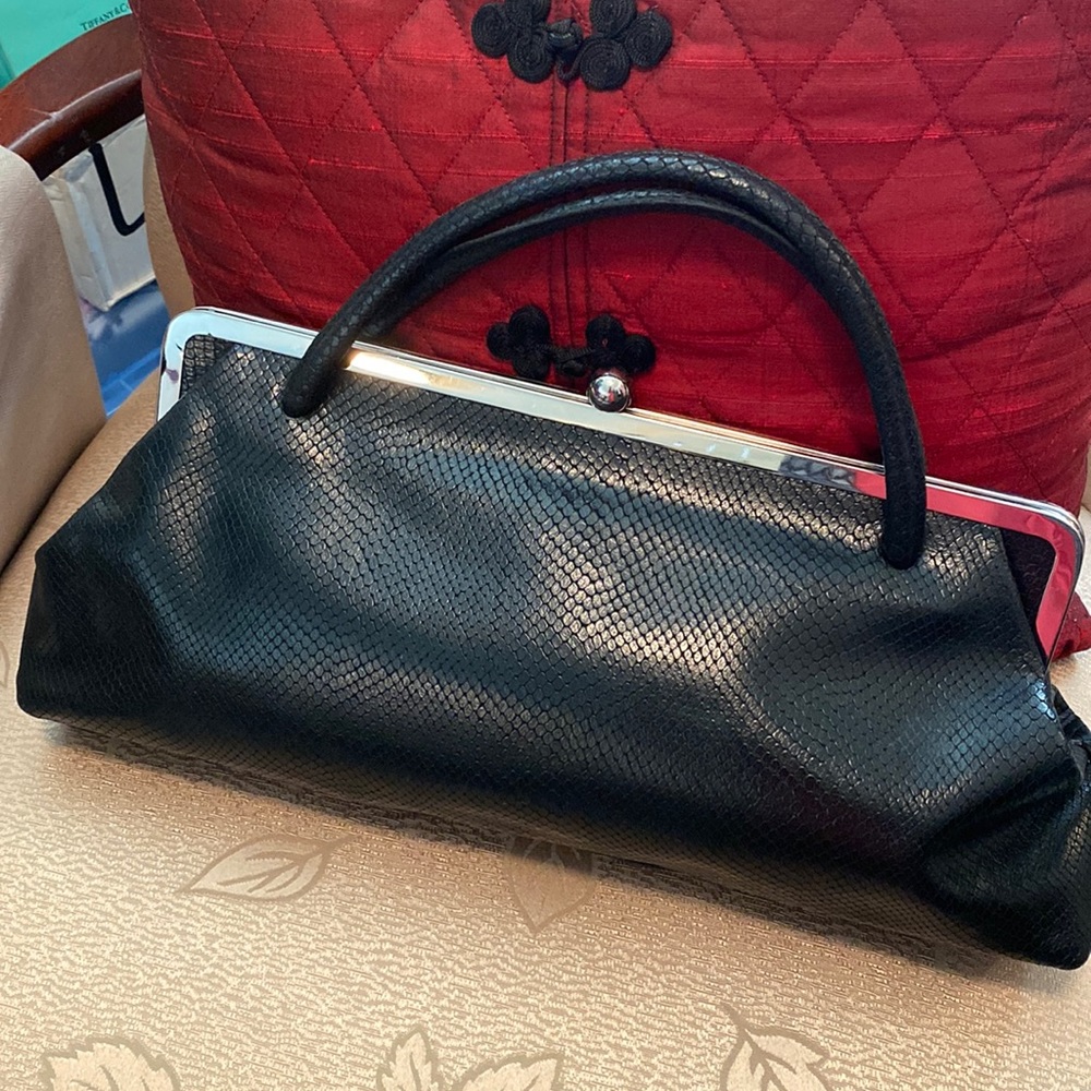 Magnetic pocket book is loved by everyone! Chic leather bag, silver ball closur…